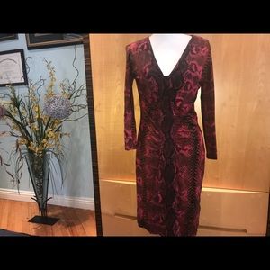 A Roberto Cavalli dress with 3/4 sleeves